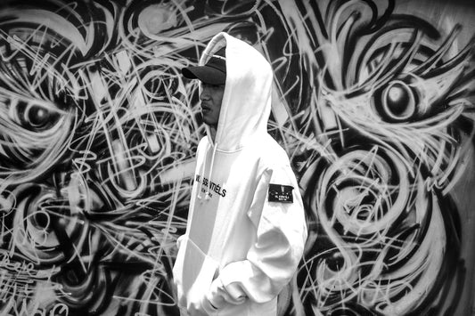 man wearing white and black pullover hoodie