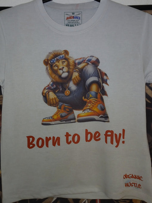 White t-shirt with a graphic of a lion and text 'Born to be fly!' on a plain background.