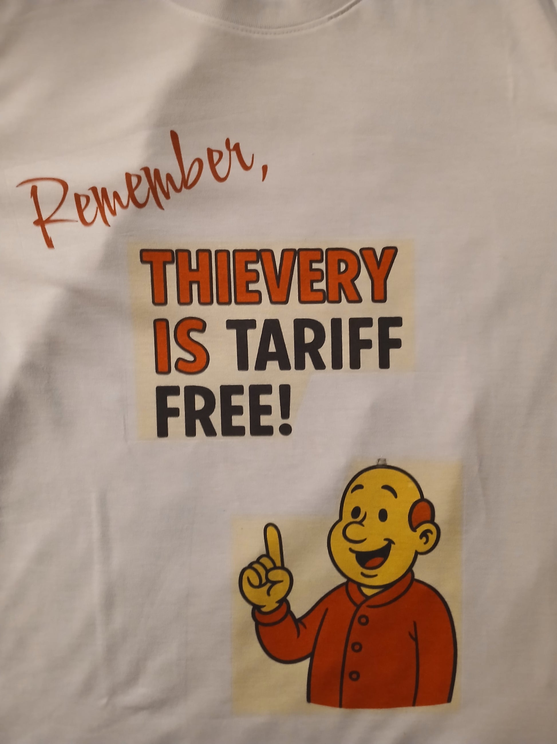T-shirt with a cartoon character and text on a plain background