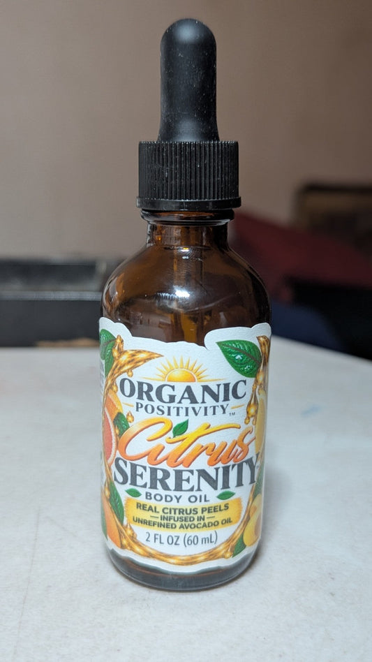 Real Citrus Serenity body oil 2 oz amber dropper bottle with new Organic Positivity label