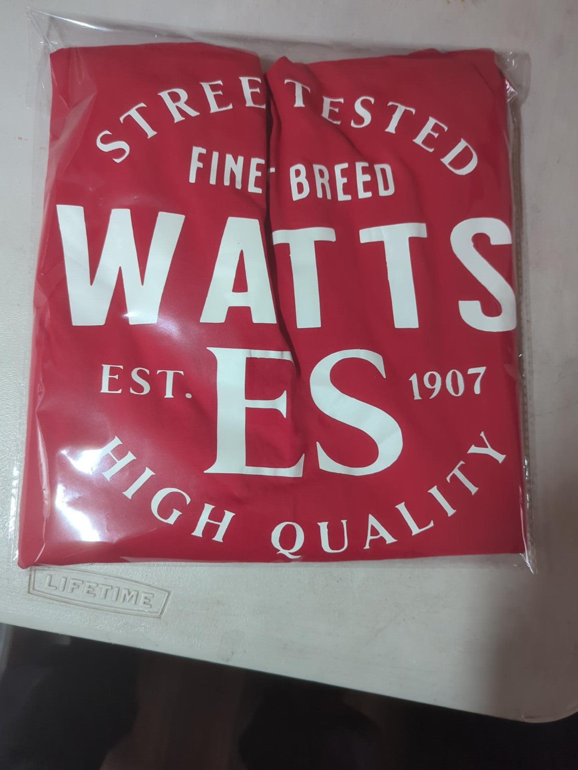 Actual packaged red Watts 1907 pullover hoodie